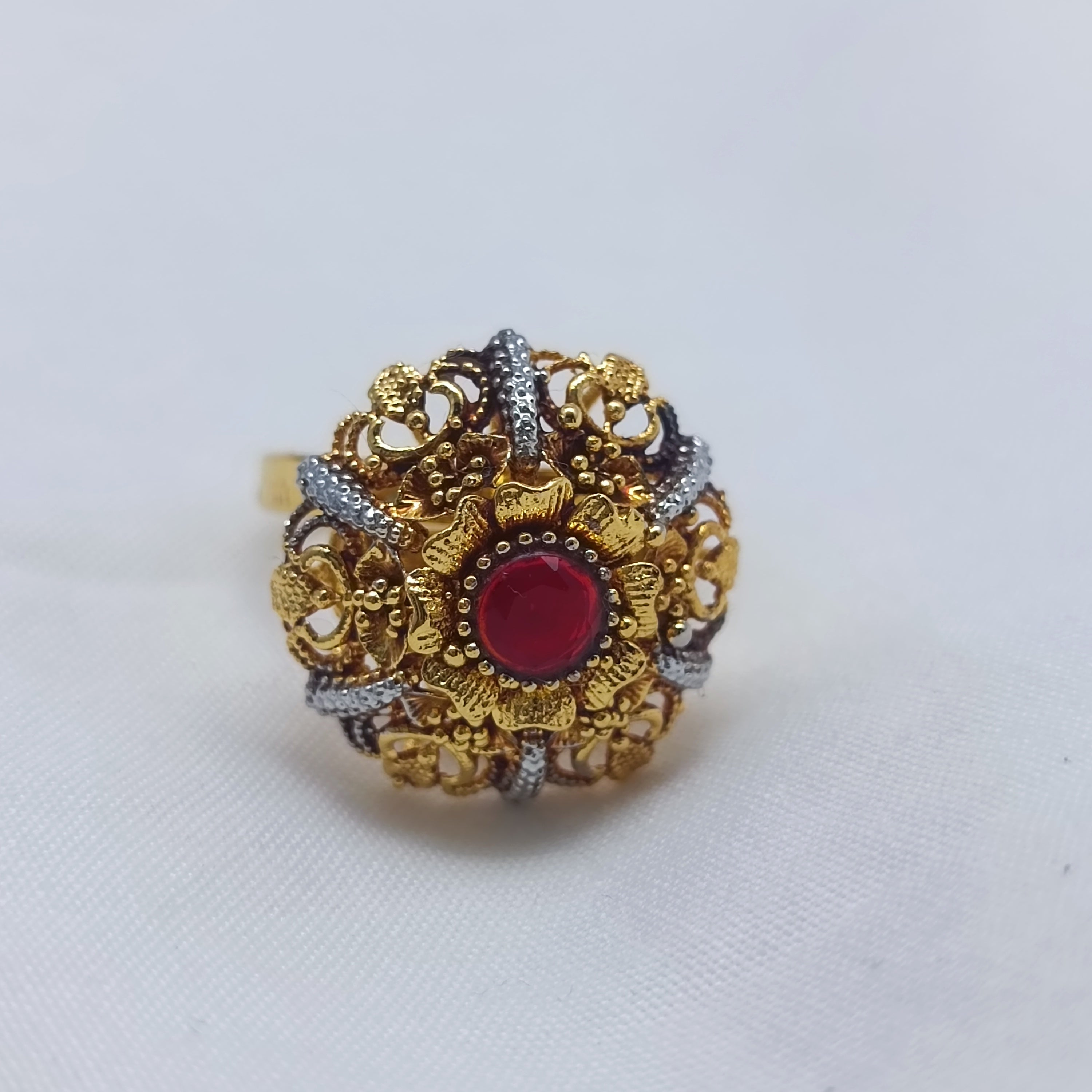 Traditional ring with red chetam stone