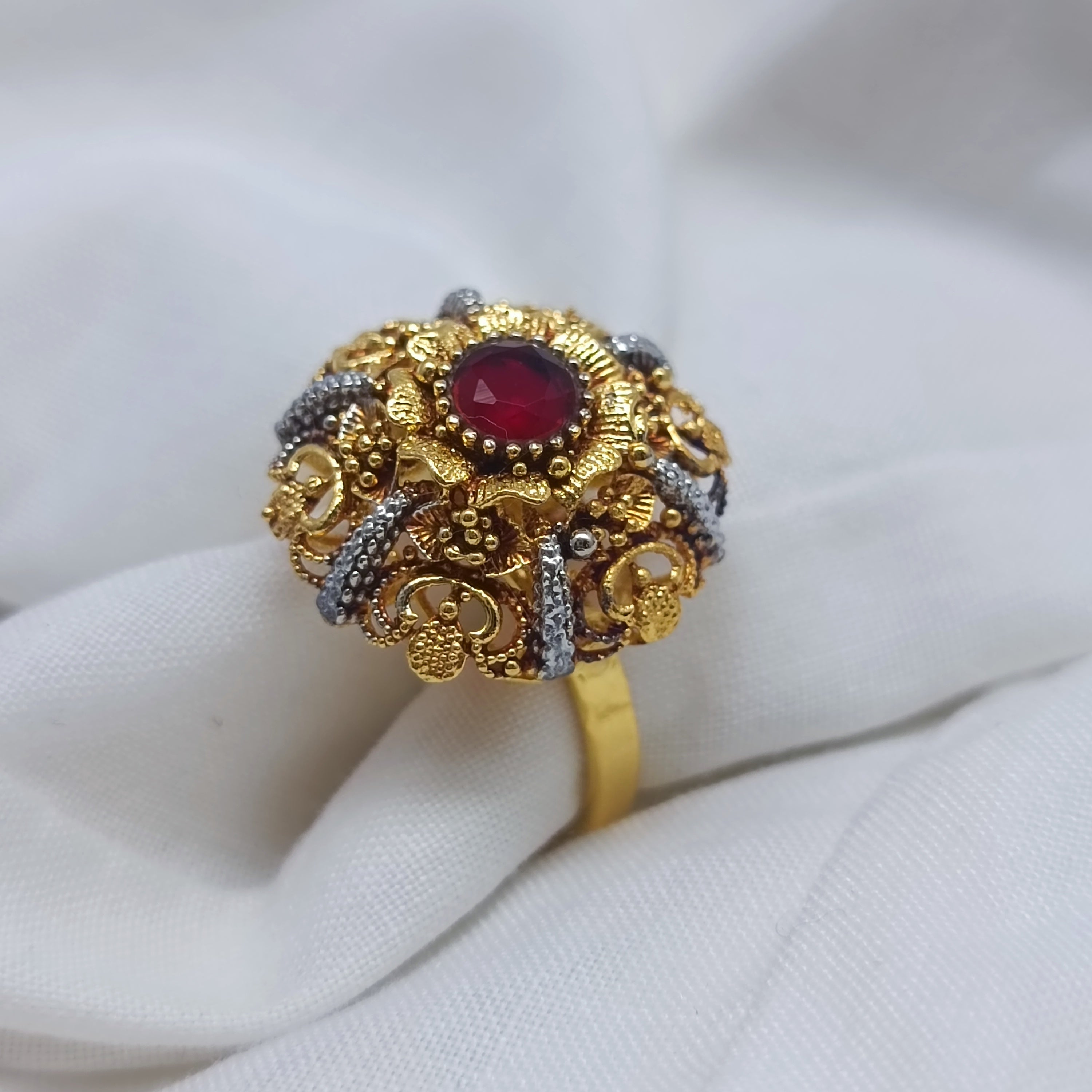 Traditional ring with red chetam stone